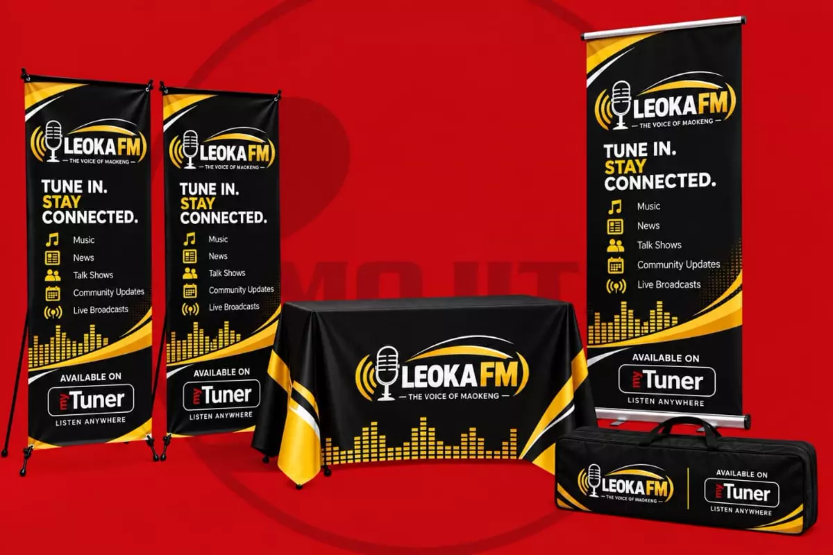 LEOKA FM promotional merchandise including pull-up banners, branded table cover and carrying bag